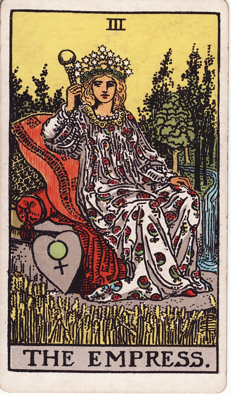 The Empress tarot card from the Rider–Waite deck, depicting a woman seated in a lush garden surrounded by nature, symbolizing abundance, nurturing energy, and growth.