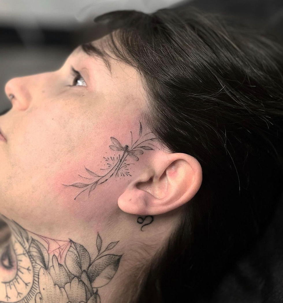 Dainty Face Tattoo