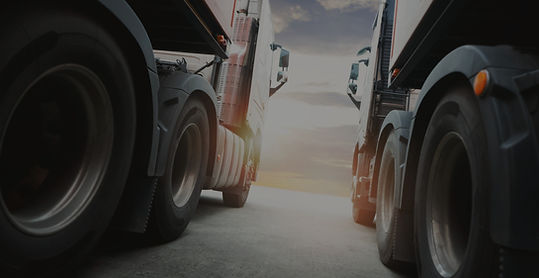 semi-trailer-trucks-parked-with-sunset-sky-shipping-cargo-container-freight-trucks-logisti