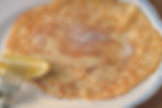 Close up of an english pancake on a plate