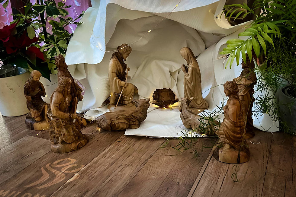 A carved-wood nativity scene