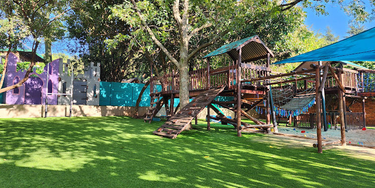 Our beautiful playground under big trees