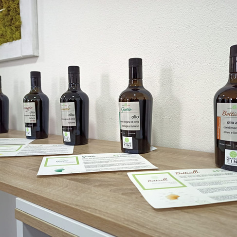 7 bottles of oil on display