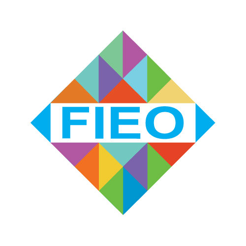 Federation of Indian Export Organisations logo features a diamond shape with a colorful geometric background made of triangles in various colors, including green, purple, orange, and blue. In the center, the acronym "FIEO" is written in bold blue letters on a white rectangular background.