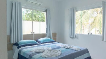 Quarto com cama no Cantinho da Melão 7