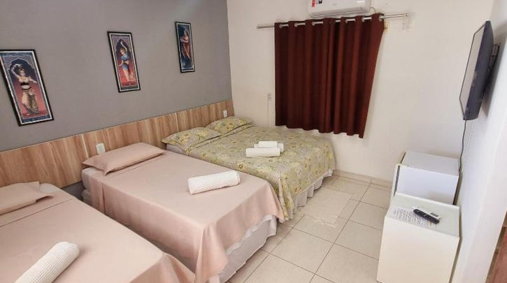 Quarto com cama no Cantinho da Melão 9