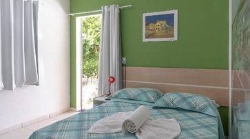 Quarto com cama no Cantinho da Melão