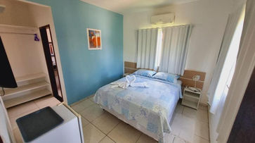 Quarto com cama no Cantinho da Melão 10