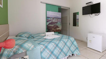 Quarto com cama no Cantinho da Melão 3