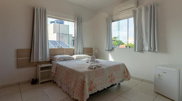 Quarto com cama no Cantinho da Melão 8
