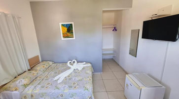 Quarto com cama no Cantinho da Melão 2