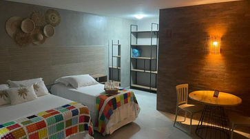 Quarto com cama na Pousada Villa Minduba 3