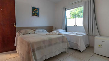 Quarto com cama no Cantinho da Melão 4