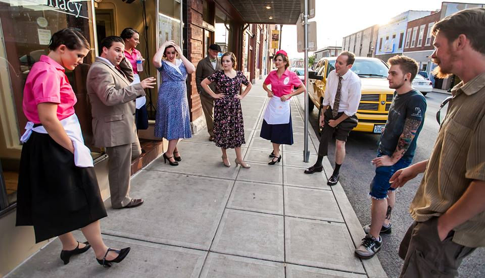 Creator, Nathan Shelton, speaks with the cast and crew outside of the diner location of Shadow Bound