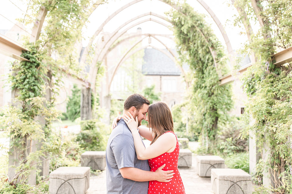 Josh and Andrea wedding photography husband and wife photographer team michigan pictures university notre dame engagement pictures session photo shoot fiance arches