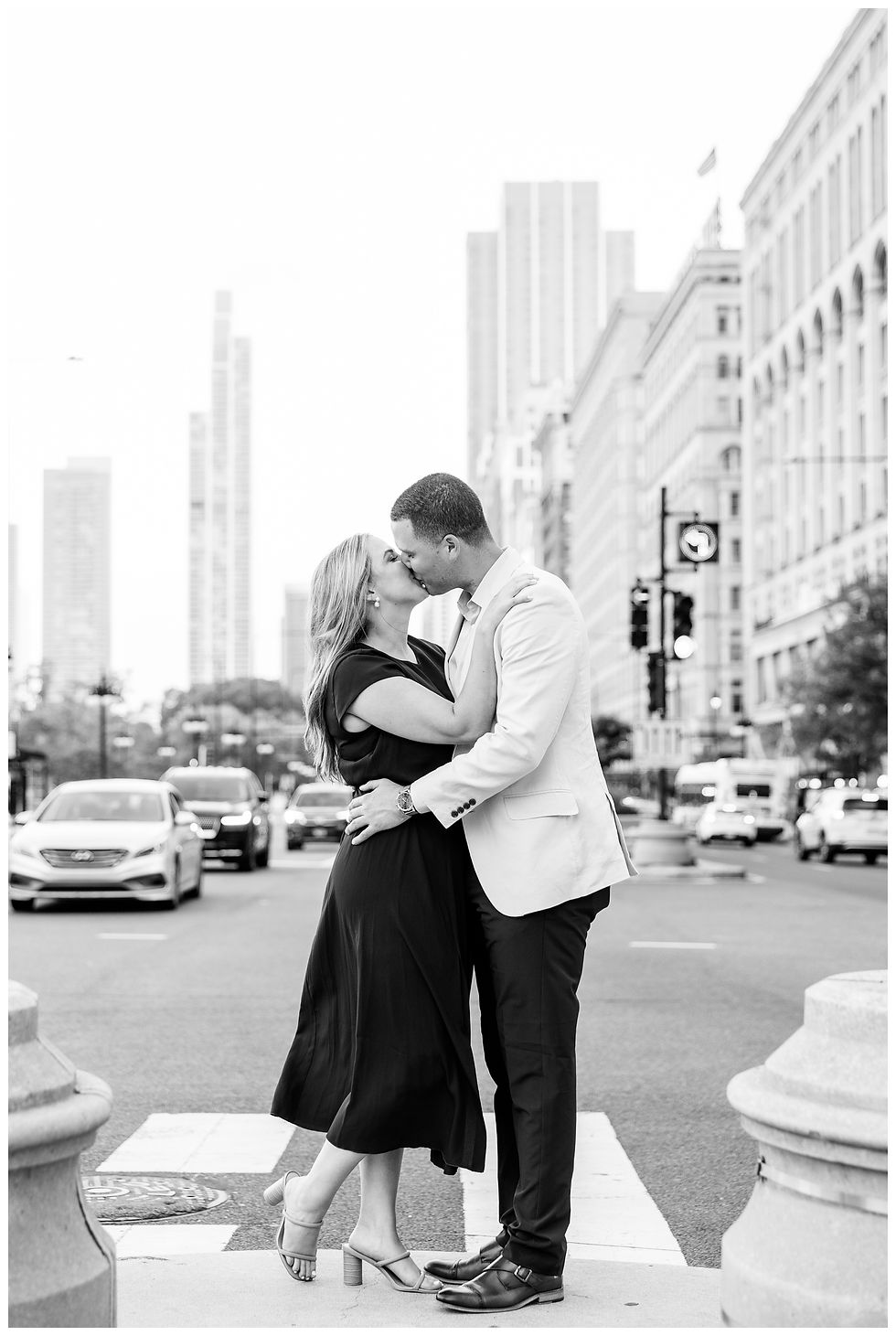 blue dress and tan jacket on Chicago engagement photo shoot by josh and Andrea photography at the grant park