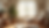 Eye-level view of a cozy therapy room with a comfortable chair and soft lighting