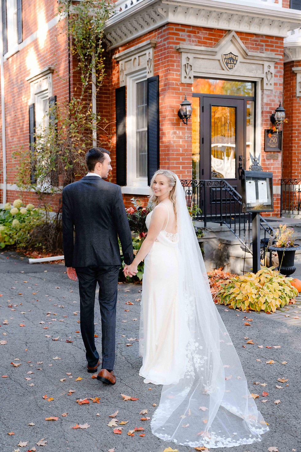 bride and groom outside an inn