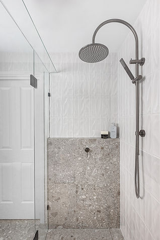 bathroom interior design, grey and green subway tiles, stacked subways feature wall, Polytec Prime Oak timber vanity cabinetry joinery, Nood Co concrete basin, ABI Interiors gunmetal tapware, feature wall light