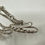 Thumbnail: CHANEL 06P Silver Cursive Logo Chain Belt & Necklace