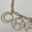 Thumbnail: CHANEL 19P Gold & Strass Logo Bubble Charm Pendant Necklace
