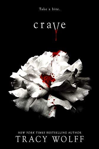 Book cover on black background with a white rose splashed in red; text reads Take a bite. crave. Tracy Wolff.