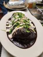 Some of our specialties Mole burrito and echiladas.