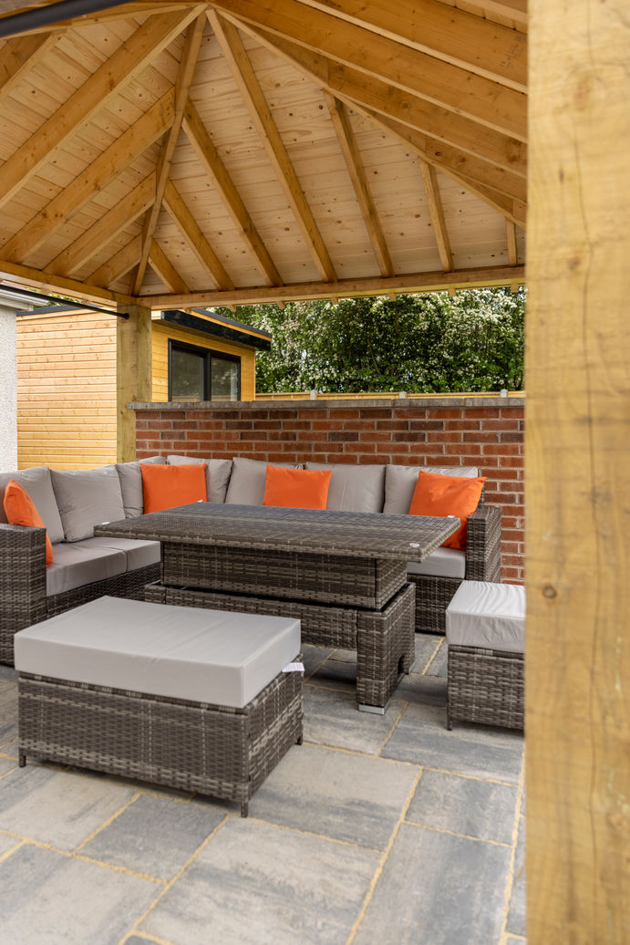 Recent garden upgrade including pergola area, new lawn, paving and fencing.  All completed by AMD Homes Ltd