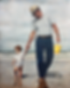 custom painting from a photo of a man walking on the beach with a child by NC artist, Katie Peña