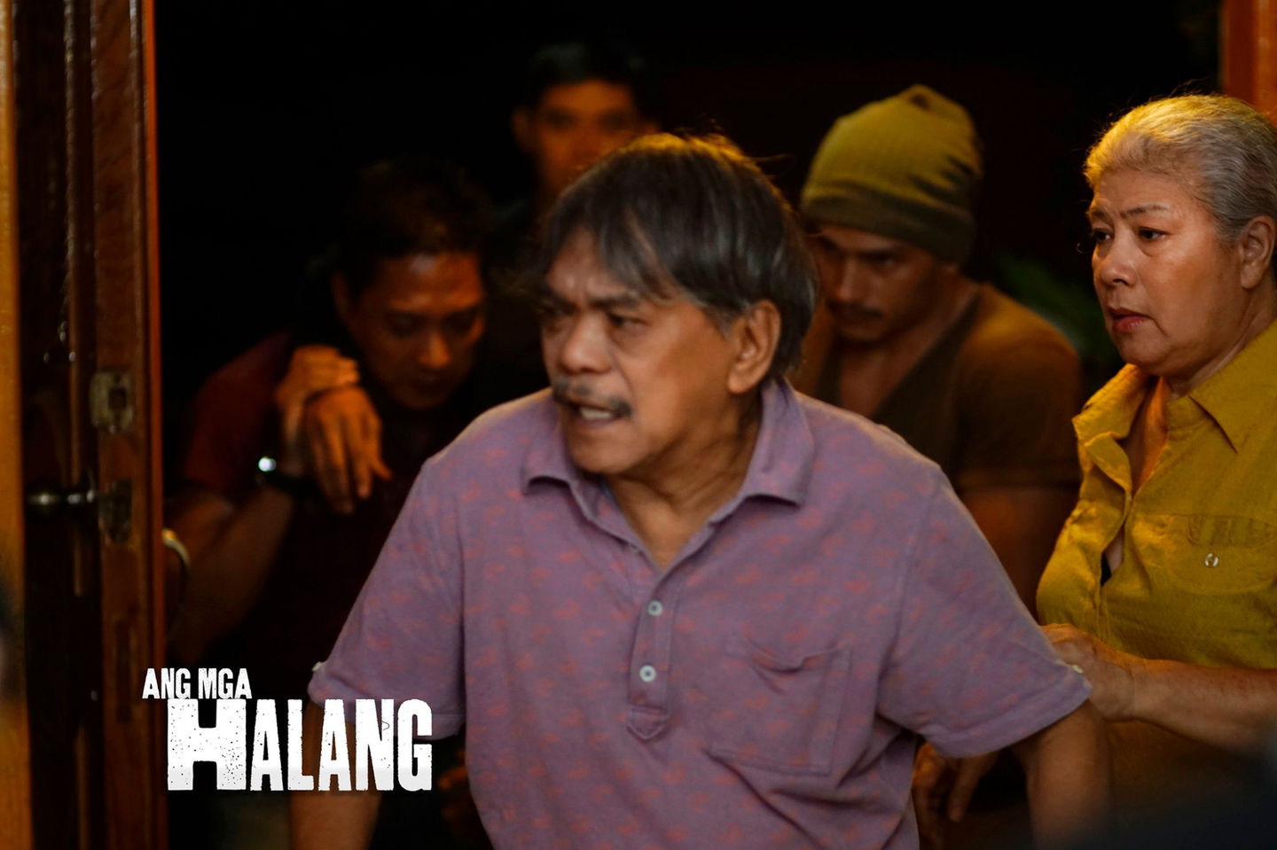 Man entering in his house distressed.  AngMgaHalangTheMovie