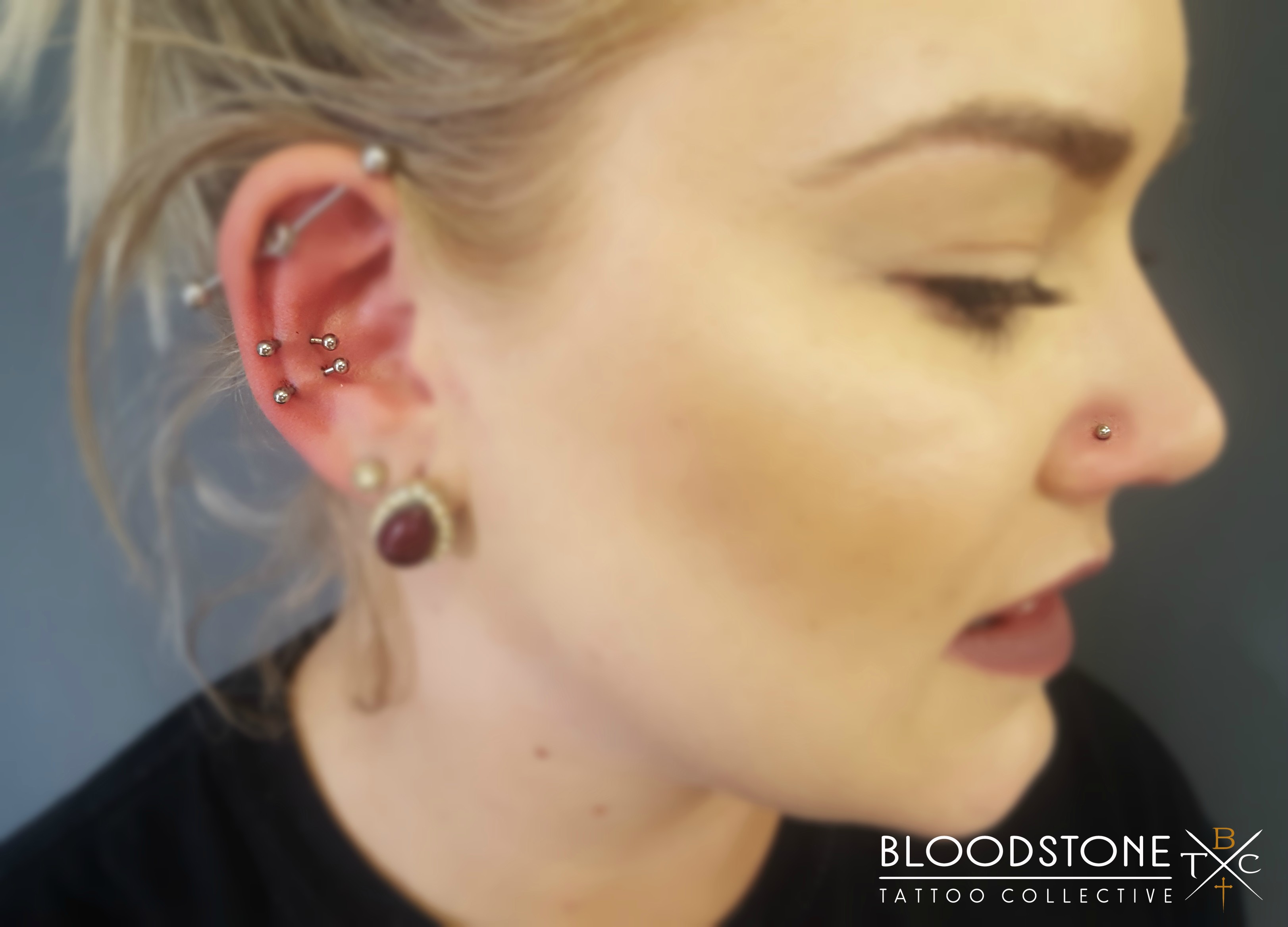 Double snug and nose piercings