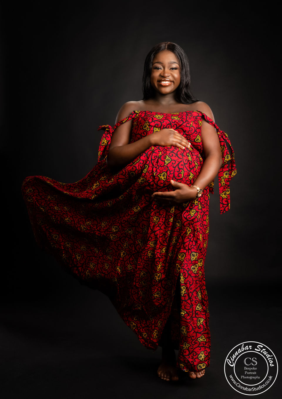 A maternity portrait taken in the studio