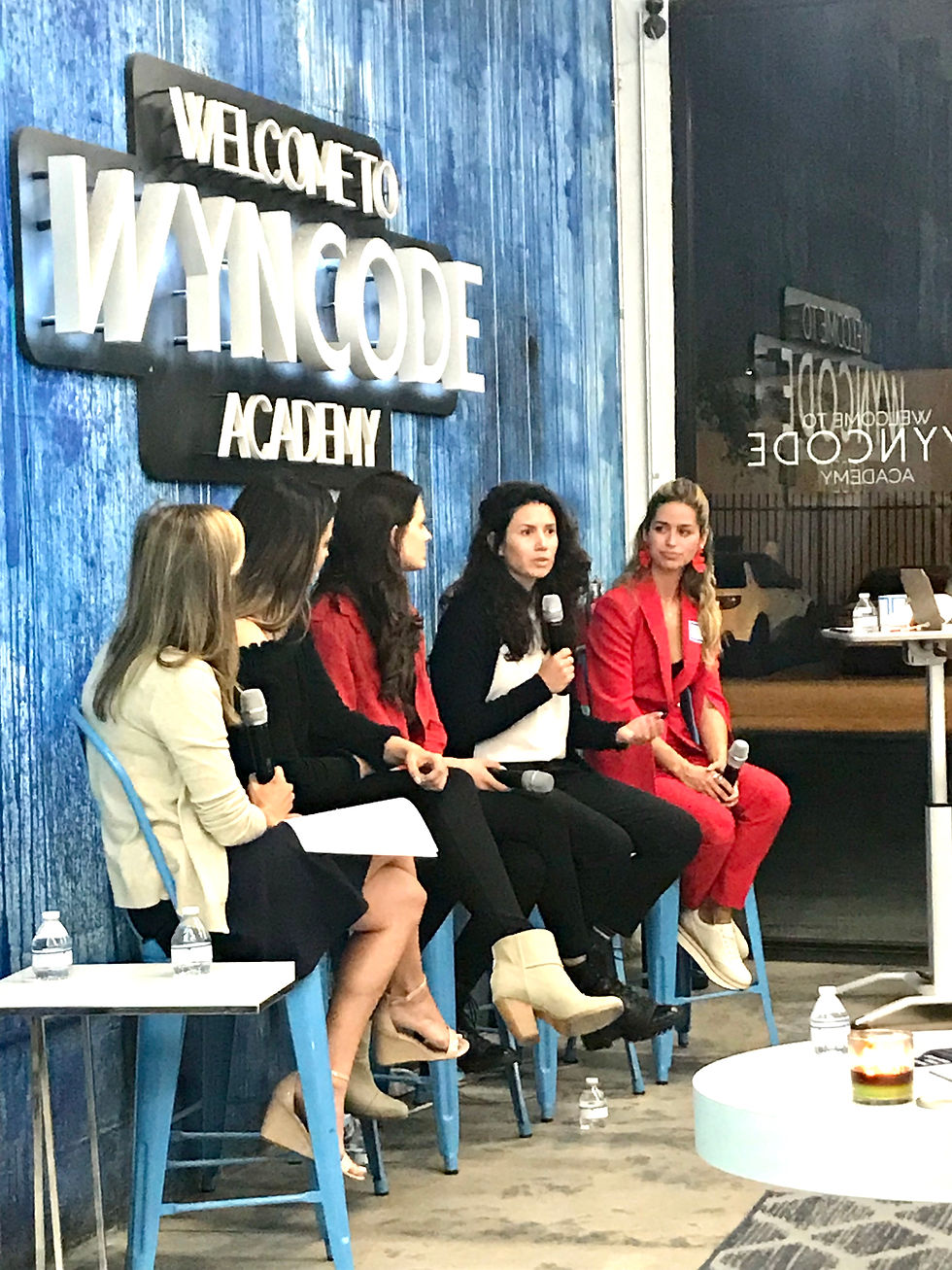 Ana Triana speaking on a panel at Wyncode Academy in 2019