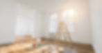Room in renovation in elegant apartment for relocation with paint bucket.jpg