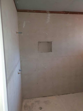 Shower niche construction during bathroom renovation