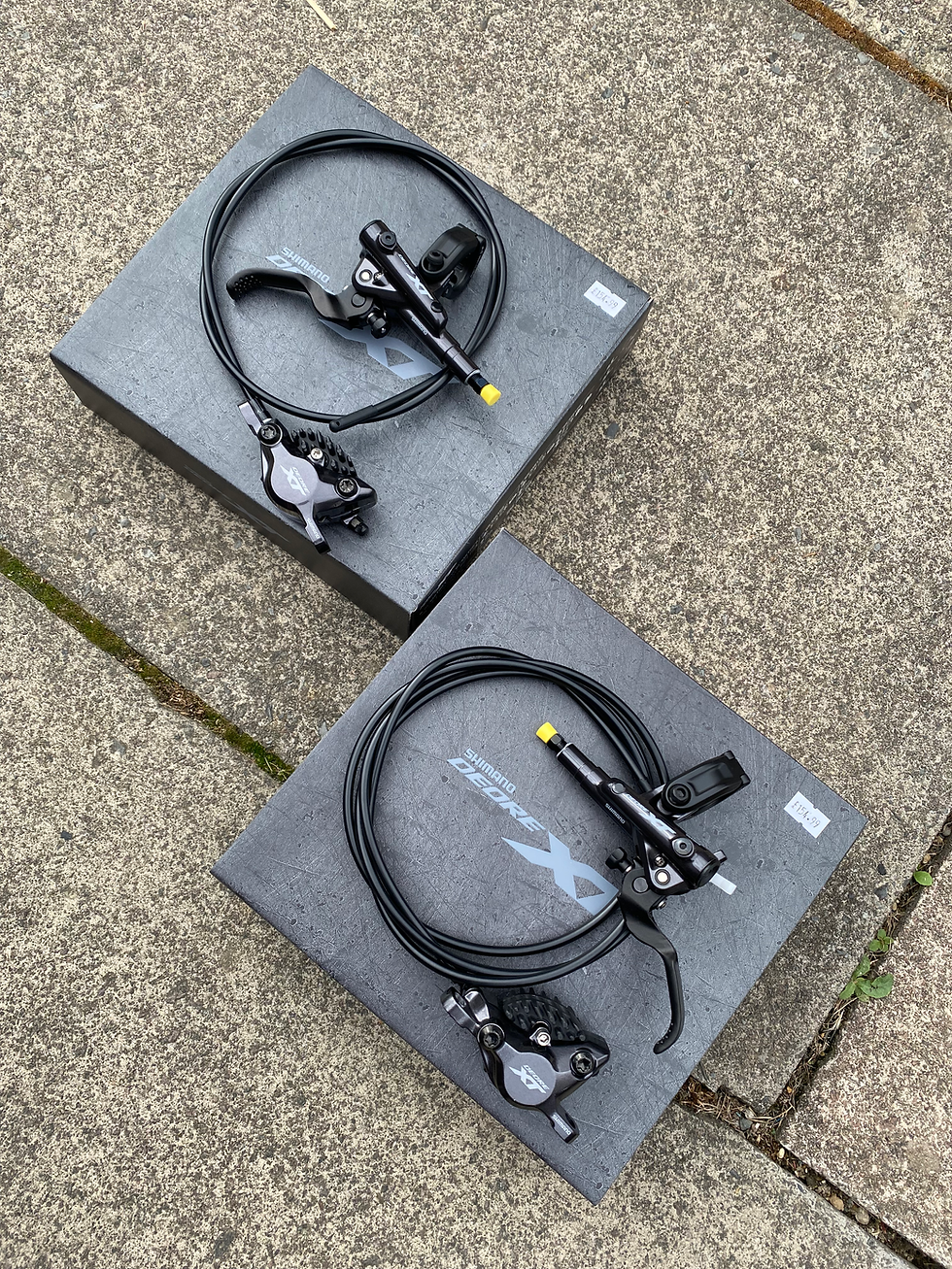 Thumbnail: Pair of XT Shimano M8100 two pot disc brakes