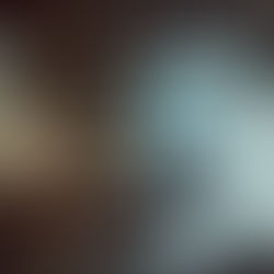 A glowing, winged stag-serpent watches over a sleeping child in an old ancestral room, symbolizing a bloodline spirit beast that returns across generations.