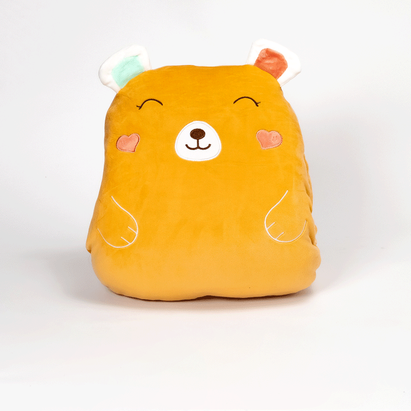 Bear Little animation; a dark yellow teddy bear that zips open to reveal a soft blanket inside.