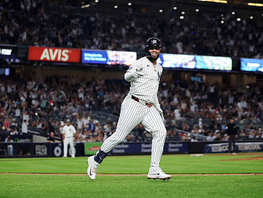 Yankees score six late to cruise past Astros 9-3