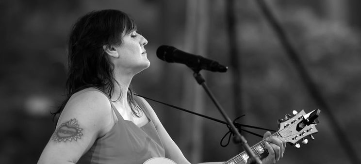 Singer songwriter with a guitar