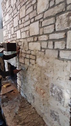 Slurry mortar on fireplace stone wall-1.