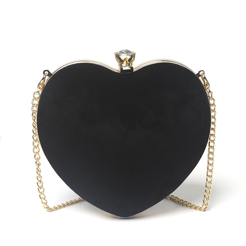 Miniatura: Heart-shaped hand holding chain bag