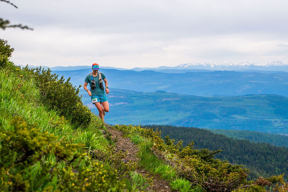 High angle view of runner climbing steep rocky trail