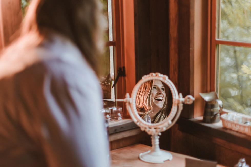 Treehouse point bride smiling