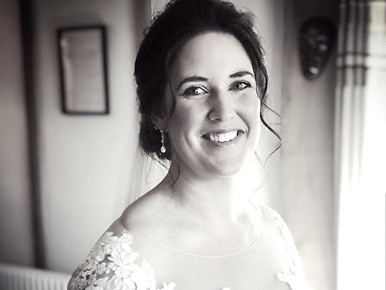 Bride smiling with vail