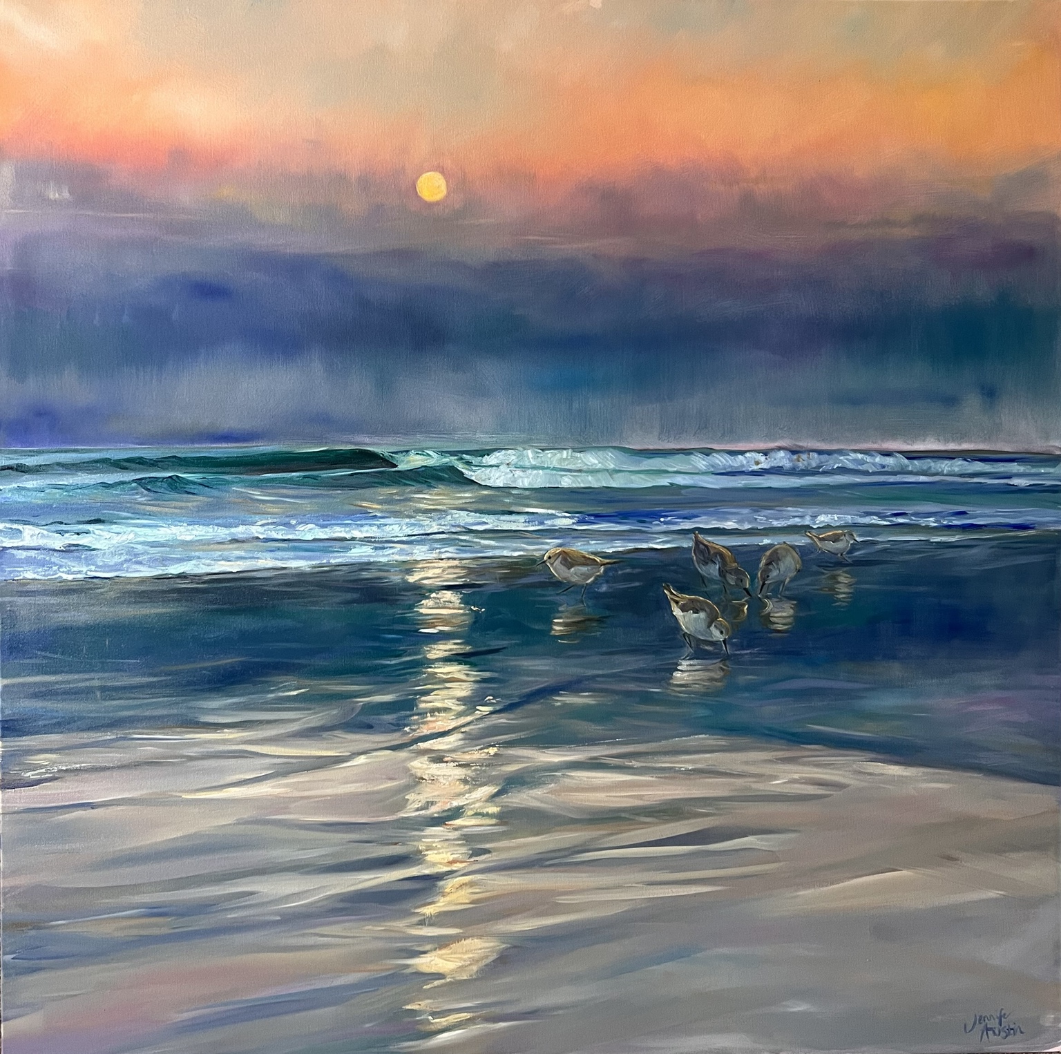 Small shorebirds in peach light across a turquoise shore