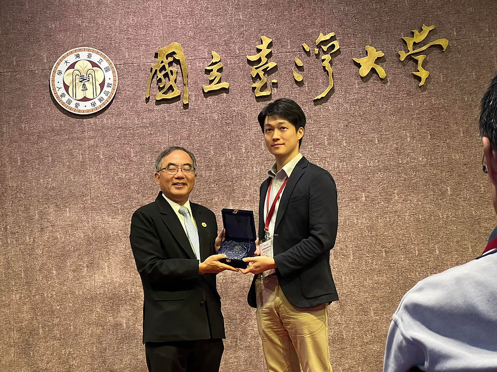 20250926 Hsi-Cheng receiving the Distinguished Award of Teaching from the principal.