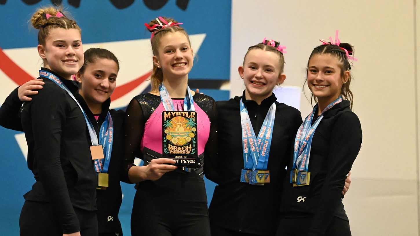 VIGS competitive gymnasts with award