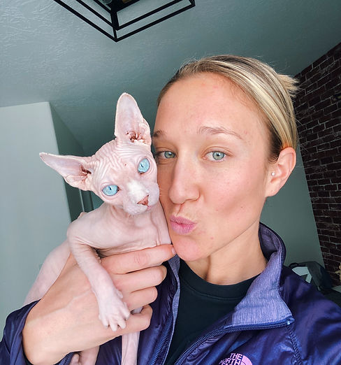 Hailey and her cat owner of Sphynx