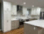 Modern kitchen with white and grey cabinets and island